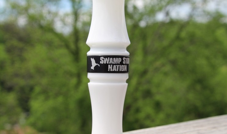 pure white goose call with black band
