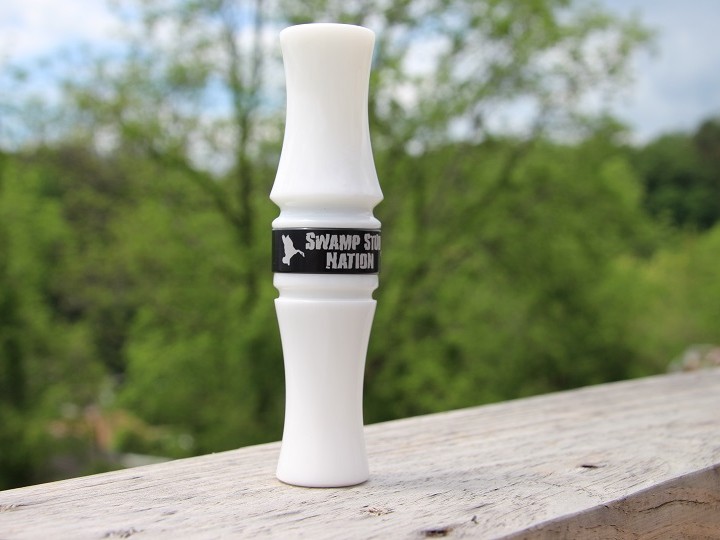 solid white goose call with black band
